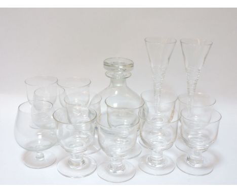 A set of ten Dartington glass goblets, a decanter, and two champagne flutes