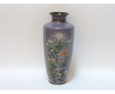 A large cloisonné enamel baluster vase, decorated with chrysanthemums on a lilac ground, 31cm high