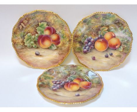 Three Royal Worcester porcelain plates, decorated with hand painted fruit and flowers in a naturalistic setting, each signed 
