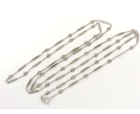 An early 19th century guard chain, with rose plaques between marquise shaped stations, marked silver