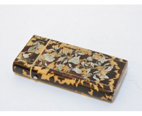 A tortoiseshell and mother of pearl cigar case