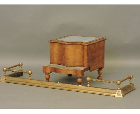 A pine blanket box, with brass handles, brass fire fender, and a commode
