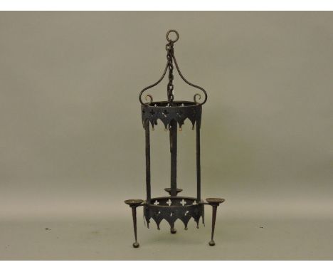 A Gothic style wrought iron candelabra, supported by a hook and chain, 89cm