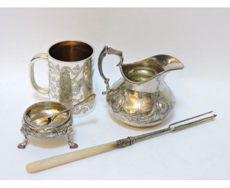 A Victorian silver cream jug, of squat form, marks for London, together with a silver christening cup, a salt, and a pickle f
