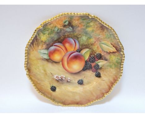 A Royal Worcester porcelain plate, decorated with peaches and blackberries, on a mossy bank, signed T Nutt, with a black back