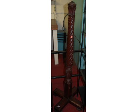 A turned mahogany standard lamp 