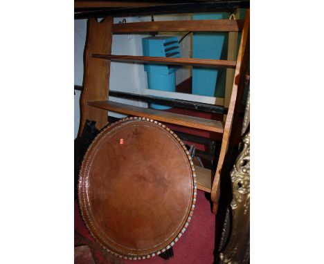An elm three tier hanging wall shelf, and a copper tray top occasional table (2)