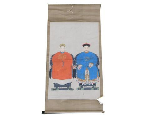 A Chinese ceremonial ancestor portrait scroll, depicting two seated family members, watercolour on silk, 208cm x 105cm.