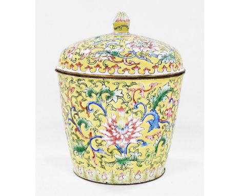A Chinese Canton enamel box and cover, of tapering cylindrical form, decorated with flowers and scrolling leaves, on a yellow