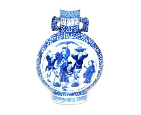 A Chinese blue and white porcelain moon flask, decorated to both sides with panels of figures, within a floral background, un