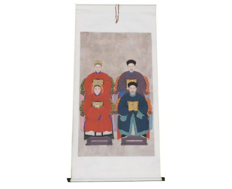A Chinese ceremonial ancestor portrait scroll, depicting four seated family members, watercolour on silk, 218cm x 103cm.