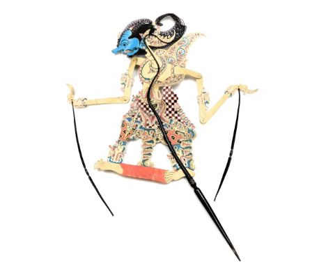An Indonesian Wayang Kulit leather shadow puppet, modelled as a figure with a blue painted face, with turned horn supports, t
