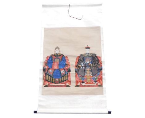 A Chinese ceremonial ancestor portrait scroll, depicting a high ranking older couple, watercolour on silk, 163cm x 92cm.