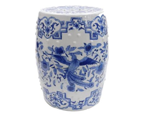 A modern Chinese porcelain barrel shaped garden seat, the pierced and 'studded' sides handpainted with blue and white decorat