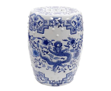 A modern Chinese porcelain barrel shaped garden seat, the pierced and 'studded' sides handpainted with blue and white decorat