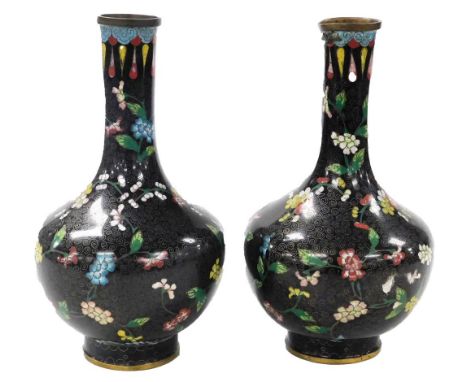 A pair of 20thC Chinese cloisonne enamel vases, of baluster form, decorated with blossom within a black ground, stamped Made 