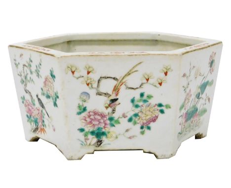A late 19thC Qing Dynasty famille rose porcelain planter, of hexagonal form, painted with birds, blossom and flowers, 23.5cm 