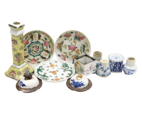 An assortment of Chinese porcelain items, including a square section candlestick, small blue and white octagonal incense burn