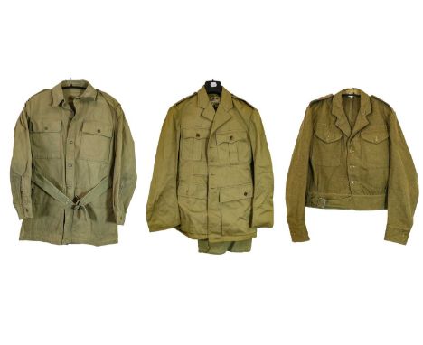 A Quantity of Second World War/Post War Khaki Drill Uniforms, including a smock and trousers, two jackets with patch pockets,