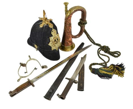 An Edwardian 1878 Home Service Pattern Blue Cloth Helmet, with gilt brass spike and ear rosettes and a brass helmet plate to 