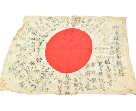A Second World War Japanese "Good Luck" Flag, of red and cream printed cotton, with numerous ink signatures and inscriptions,