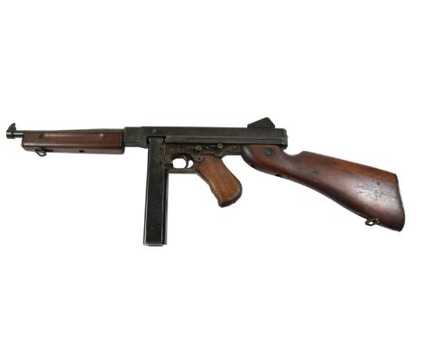 A Deactivated Thompson M1A1 Submachine Gun, .45 calibre, no.818191, with wood fore-end, grip and stock, detachable stick maga