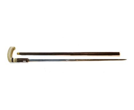 A 19th Century Spanish Swordstick, the 72.5cm blade of diamond section for the last 45cm, engraved ARTA. FABA. DE TOLEDO 1881