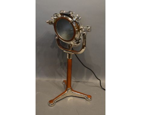 A Chromium and Leather Desk Lamp in the form of a port hole 49cm tall 