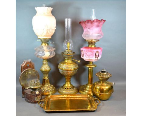 A Victorian Brass Oil Lamp with Opaque Glass Shade and Chimney together with another similar two other lamp bases and a coppe