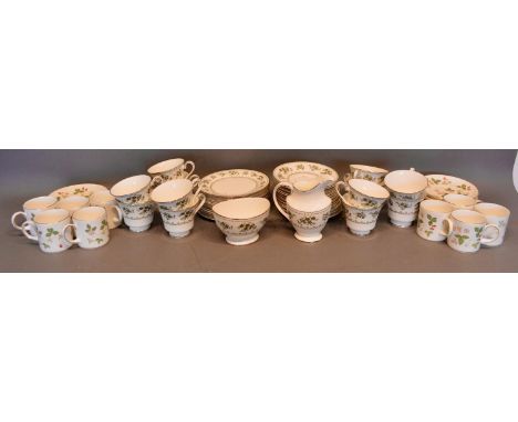 A Wedgwood Coffee Service, together with a Royal Doulton tea service 