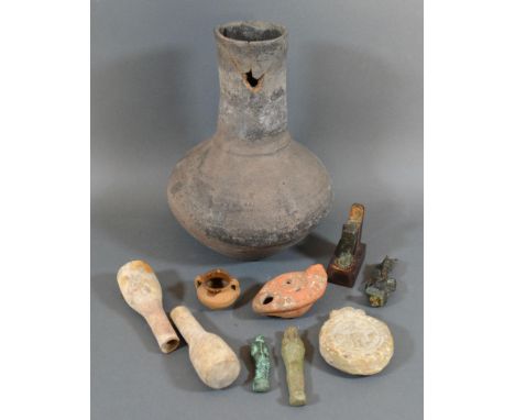 An Early Terracotta Oil Lamp together with a collection of related items 
