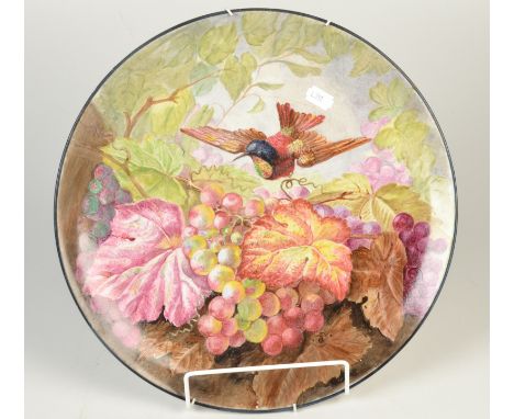 A Victorian enamelled earthenware plaque by Hancock & Son, Worcester, well painted with a hummingbird over a fruiting vine, d
