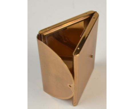 An envelope shaped, engine turned, gilt metal compact by Coati circa 1954.