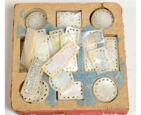A collection of Chinese engraved and pierced mother of pearl gaming counters, approximately  52 measuring 40 x 14mm, approxim