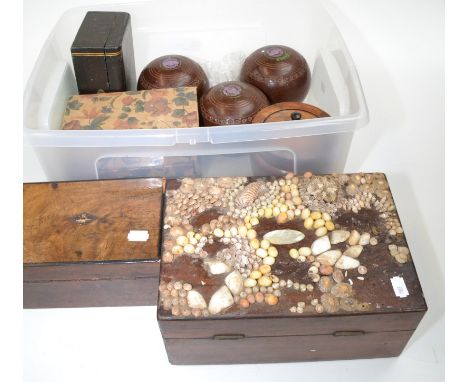 Four boxes, a turned wood tea caddy, and four bowling woods.
