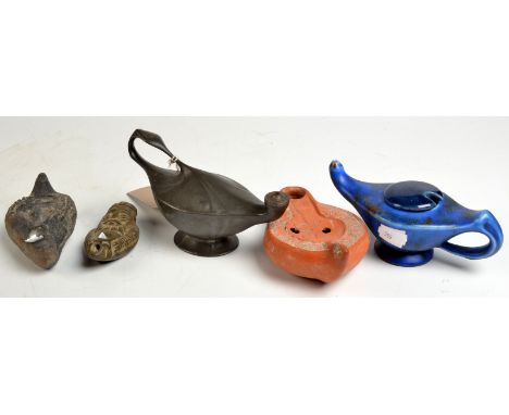 A Kayserzinn wick lamp, together with four other wick lamps.