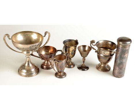 Six small silver cups, 16oz and one other piece.