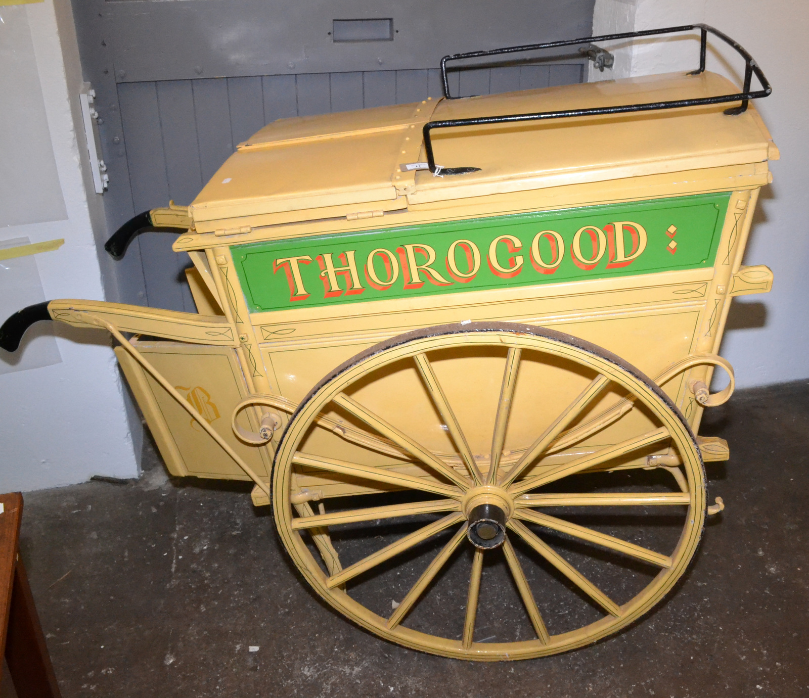A late Victorian or Edwardian bread cart with spoked 80cm wheels