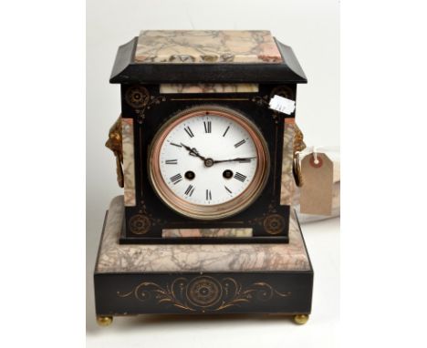 A slate and marble mantle clock with cast gilt lion mask handles, height 28cm.