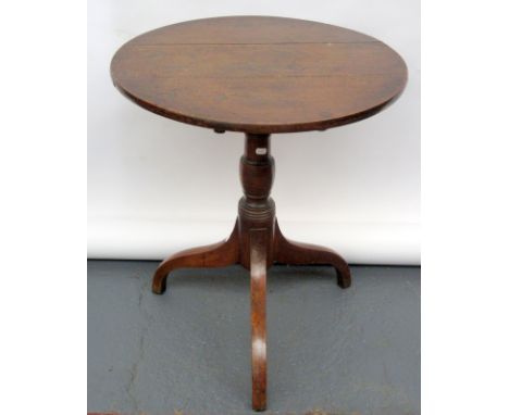 An oak late Georgian tripod table, diameter 60.5cm. 