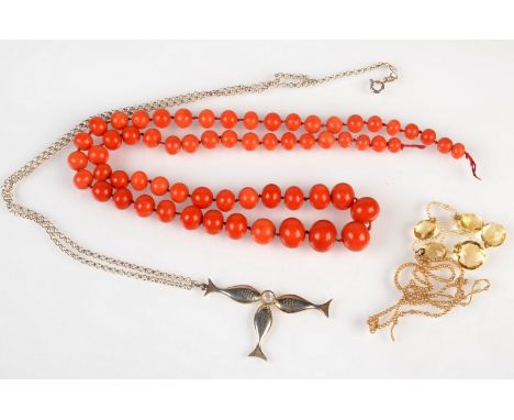 A citrine and seed pearl necklace, damaged, a coral necklace and one other necklace.  Condition Report: Coral necklace weight