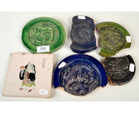 Five late Ming period tile fragments, together with one other tile.
