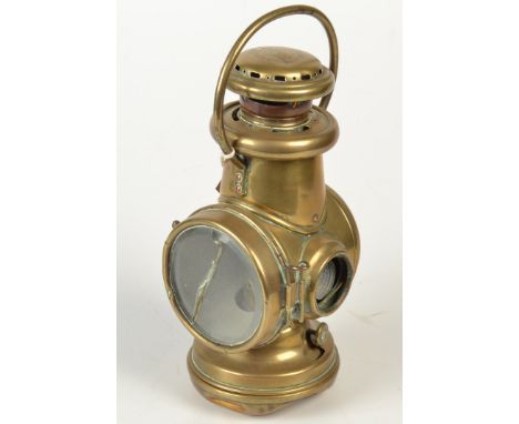 A Powell & Hanmer brass 'Motor Tail' lamp, height including handle 28cm.