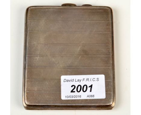 An engine turned silver cigarette case, 4oz.