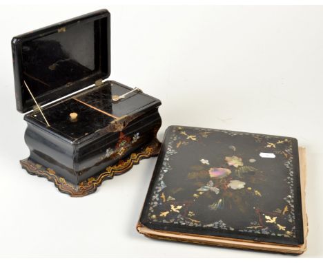 A Victorian black papier mache and mother of pearl inlaid, two section tea caddy and a similar blotter.
 Condition Report: Te