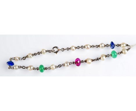 A platinum natural pearl, sapphire and emerald bead bracelet. 