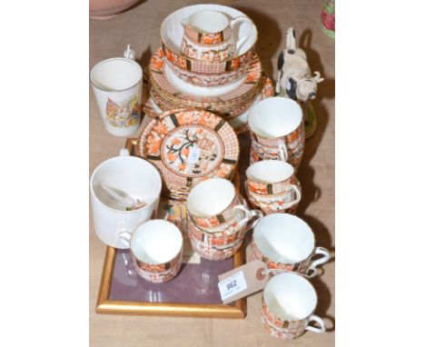 An Edwardian tea and coffee service, a Staffordshire cow etc. 