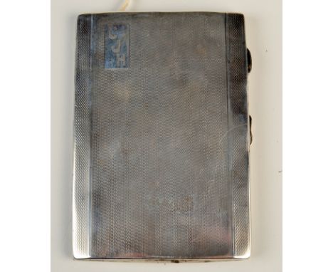 An engine turned silver cigarette case, 4.5oz.