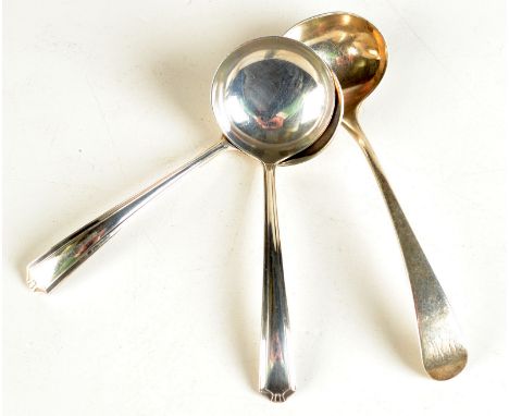 A small George III, Old English pattern sauce ladle and two other small ladles.