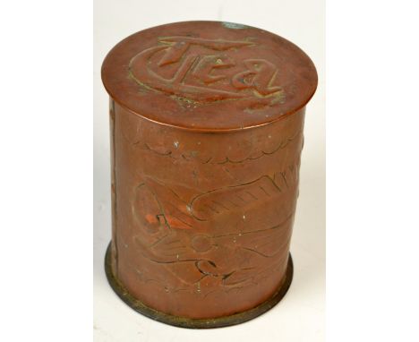 A Newlyn Copper cylindrical 'Tea' caddy, relief decorated with fish amongst seaweed. Impressed Newlyn. Height 10cm.

